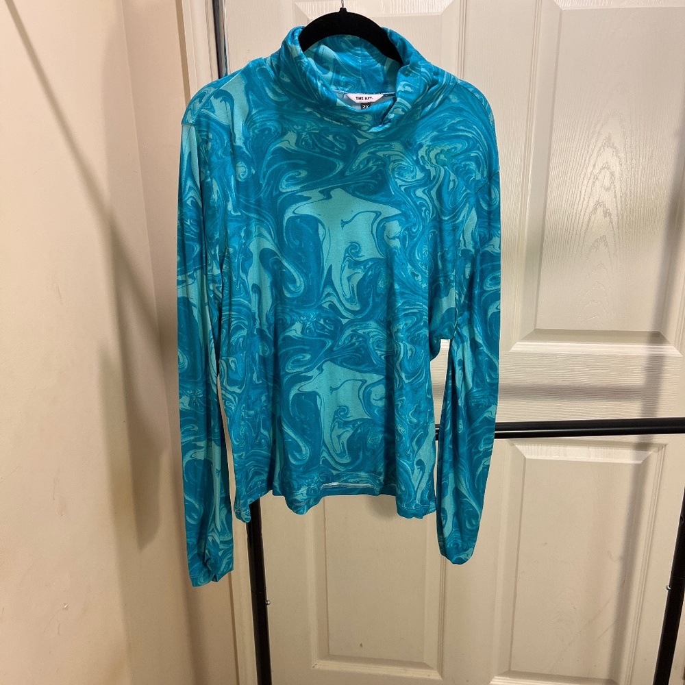 Blue color swirl turtleneck